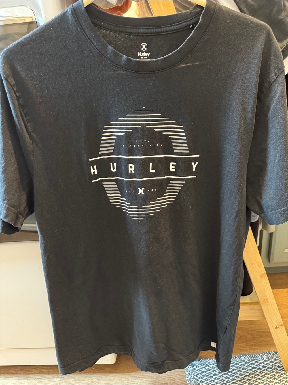 Men’s medium Hurley Black short sleep fits like women’s large.Not faded like pic